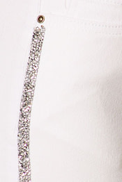 rhinestone jeans in white close up view of gems