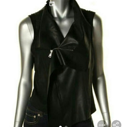 mannequin display of a womens black faux leather top