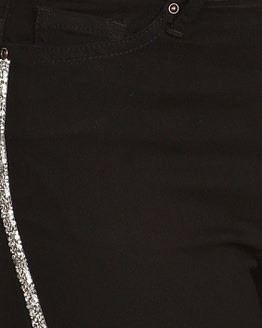 close up view of striped jeans in black with a rhinestone trim